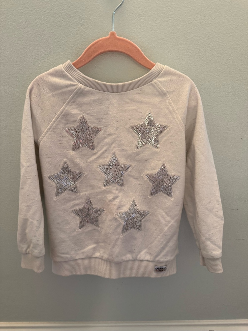 Calvin Klein Girls Cream Sweatshirt with Silver Sequin Stars